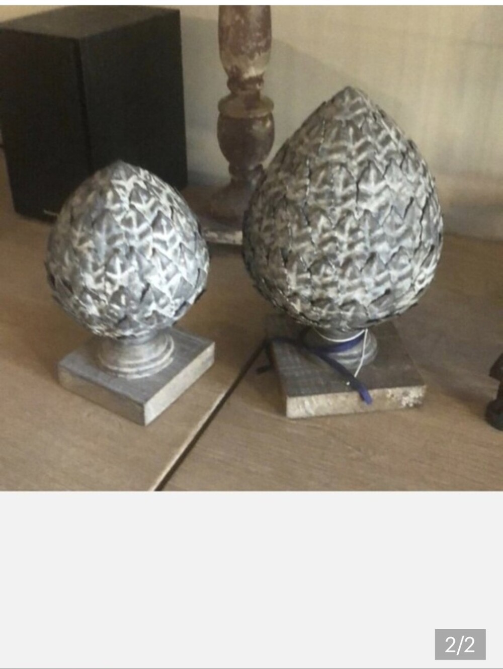 Two decorative finials